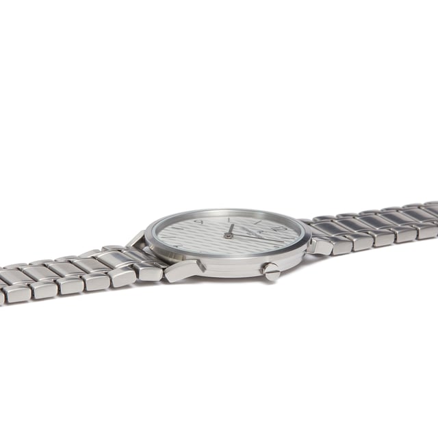 This Pierre Cardin Pigalle Stripes Analogue Watch for Men is the perfect timepiece to wear or to gift. It's Silver 40 mm Round case combined with the comfortable Silver Stainless steel watch band will ensure you enjoy this stunning timepiece without any compromise. Operated by a high quality Quartz movement and water resistant to 3 bars, your watch will keep ticking. This fashionable and classic watch matches any outfit at any occasion,it adds style to your life High quality 21 cm length and  18 mm width Silver Stainless steel strap with a Fold over with push button clasp Case diameter: 40 mm,case thickness: 6.55 mm, case colour: Silver and dial colour: White