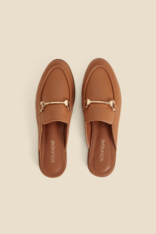 Dress from the feet up
Easy slip-on backless style
Wear-with-everything neutral
Timeless snaffle trim detail
They'll take you from work to weekend
We love them with white denim or linen trousers