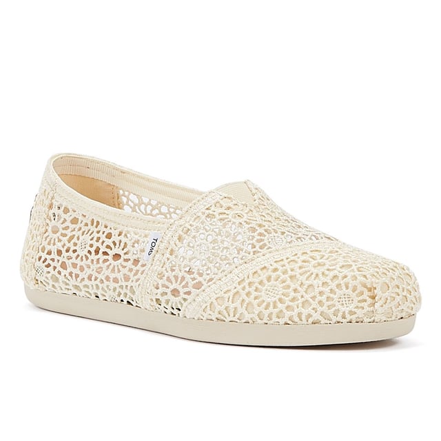 Experience ultimate comfort and style with our exquisite crochet uppers, complemented by the cutting-edge TOMS CloudBound Sole. Crafted to provide exceptional comfort, cushioning, and traction, these shoes are a true delight for your feet. The textile upper is not only trendy but also 100% vegan, making it a perfect choice for conscious consumers. With a removable insole and elastic gore for effortless on-and-off, these shoes are designed to enhance your convenience. Step into a world of comfort and sustainability with our remarkable footwear.