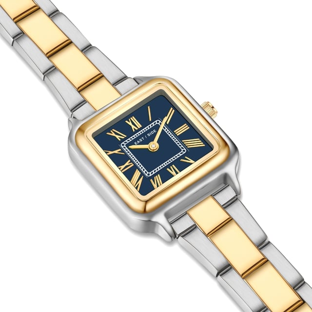 GENERAL INFORMATION:  • Targetgroup: Female  • Wristwatch: No Special Functions  • Display: analogue  • Weight of watch w/o box (gr.) - approx.: 60  MOVEMENT:  • Movement: Quartz  • Term of Movement: 2025  • Origin of movement: Japan  BRACELET:  • Material of bracelet/strap: Stainless steel  • Plating of bracelet/strap: No, IP-Plating  • Finishing of bracelet/strap: Smooth  • Finishing/Decoration of bracelet/strap: None  • Clasp/Closure/Buckle: Security-folding clasp  • Color of bracelet/strap: Silver/yellow gold  • Length of bracelet/strap (mm) approx.: 210,0  • Width of bracelet/strap (mm) approx.: 13,7  • Style/Design of bracelet/strap: Link bracelet  • Bracelet/strap adjustable?: Yes  CASE:  • Shape of case: Square  • Size/Diameter of case in mm . approx.: 25,0 x 32,0  • Height of case in mm: 8,2  • Case material: Metal (Alloy)  • Surface of case: Polished  • Bezel/Topring: Fixed  • Finishing/Decoration of case: None  • Material of case back: Stainless steel  • Lock of case back: No screwed-in crown  • Color of case: Silver/yellow gold  • Coating/Plating (Case): No, IP-Plating  • Type/Form of crystal: Flat  • Material of crystal: Mineral crystal  DIAL:  • Size jewelry care cloth: Hour, Minute  • Indices: Roman indicies  • Material of dial: Brass  • Structure/pattern of dial: Flat  • Color of dial: Blue  PUSHER, CROWN, HAND:  • Pusher: None  • Corrector: No  • Crown: No screwed-in crown  • Type of hands: Pole hand  • Luminescent (hands): No  PACKAGING & SCOPE OF DELIVERY:  • Box: Yes  • Service booklet: Yes  • Manual: Yes