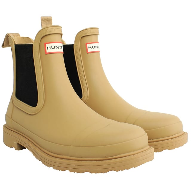 Hunter Commando Women's Brown Chelsea Boots â€“ where rugged sophistication meets urban style. These boots are crafted to seamlessly blend fashion with functionality, providing a versatile and durable footwear option for the modern woman. Here's a detailed description highlighting the key features of these boots:

 Rugged Elegance:  The Hunter Commando Chelsea Boots exude rugged elegance with their brown hue and timeless Chelsea boot silhouette. This versatile color adds a touch of warmth and complements a variety of outfits, making them a wardrobe staple for any season.

 Durable Construction:   Built for the demands of both city streets and outdoor excursions, these boots feature a durable construction that stands up to daily wear. The high-quality materials ensure longevity, making them a reliable choice for various activities and environments.

 Chelsea Boot Convenience:   The slip-on Chelsea boot design offers effortless style and convenience. With elastic side panels and a pull tab, these boots are easy to put on and take off, allowing you to transition seamlessly from casual outings to more adventurous pursuits.

 Comfortable Interior:   Experience all-day comfort with the cushioned insole and breathable lining of these boots. Whether you're navigating city sidewalks or exploring nature trails, the interior design ensures a comfortable and supportive fit for extended wear.

 Versatile Styling:   The rich brown color and classic Chelsea boot design make these boots incredibly versatile. Pair them with jeans for a casual look or incorporate them into your work attire for a touch of rugged sophistication. The Commando boots effortlessly elevate your style in any setting.

 Grip and Traction:   The rugged outsole is designed to provide excellent grip and traction on various surfaces. Whether you're walking on wet pavement or uneven terrain, these boots offer stability and prevent slips, allowing you to move confidently through your day.

 Weather-Resistant Finish:   Navigate changing weather conditions with ease. The weather-resistant finish on these boots ensures they can handle light rain or unexpected drizzles, keeping your feet protected and stylish regardless of the forecast.

Step out in style and confidence with the Hunter Commando Women's Brown Chelsea Boots â€“ a perfect balance of fashion-forward design and practical functionality. From city streets to outdoor adventures, these boots are your go-to choice for a seamless blend of elegance and durability.