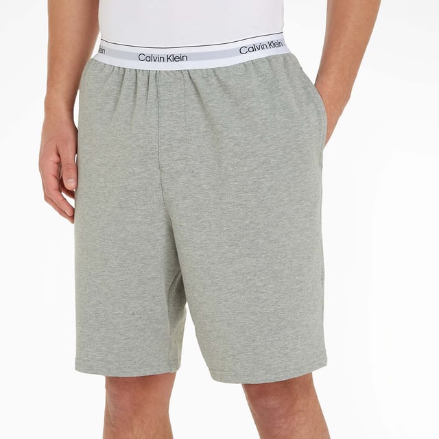 Mens Calvin Klein Lounge Shorts in grey.- Branded elasticated waistband.- Regular fit.- Ref: 000NM2303EP7A