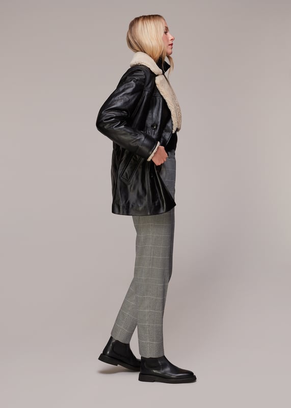Discover the perfect blend of style and comfort with our Lucie Check Cigarette Trousers – your go-to for any occasion.