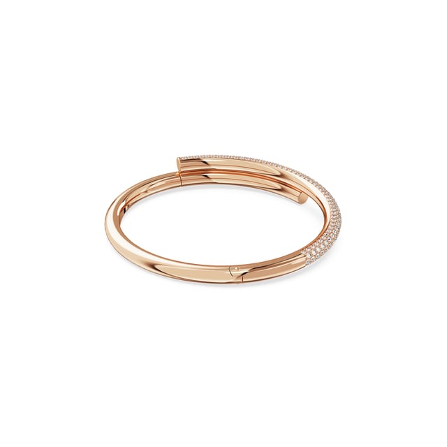 This dazzling Bracelet for Women from Swarovski is the perfect gift to spoil yourself or a loved one. The Bracelet is made out of Gold Plated Metal, colored Rose at Length: 17.4 cm weighing in at  grams with a Width of 6.3 cm at its widest point. The Swarovski 'Dextera' Women's Gold Plated Metal Bracelet - Rose 5692267 is delivered in a stunning gift box and carries a two year warranty.