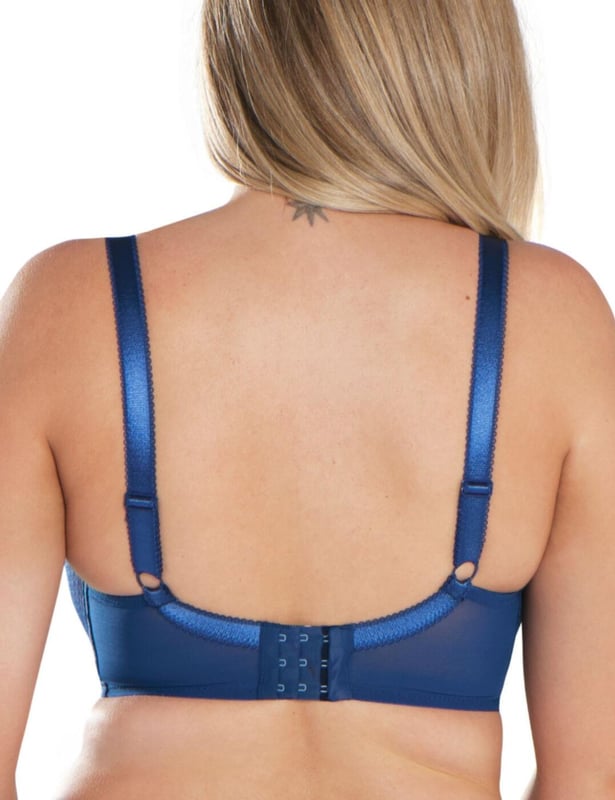 Look and feel amazing in the new sexy Tease balconette bra by Curvy Kate! This bra has lightly padded foam cups in a gorgeous balcony style which is overlaid with black mesh for support, uplift and a gorgeous shape! The bra is finished in rich embroidered lace and intertwined ribbon to complete the sophisticated look! The bra is designed with a satin base on the cups and is finished with a pretty bow at the cleavage. Also offering a hook and eye closure, this bra features fully adjustable straps for your individual fit and feel! Pair with matching items from the Tease range for a stunning new look for your lingerie wardrobe!

Elegant, sexy design
Popular balcony design
Comfortable and contemporary fit
Underwired for support and lift
Lightly padded for a natural rounded look
Secures at the rear with hook and eye fastening
Adjustable straps
Composition:- 54% Nylon | 35% Polyester | 11% Elastane

Matching items available
Listed in UK sizes 
 Balcony bra