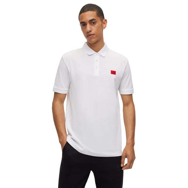 Men's polo shirt from the HUGO brand. Plain-coloured pique polo with woven label on the left chest. Made of pure cotton.
