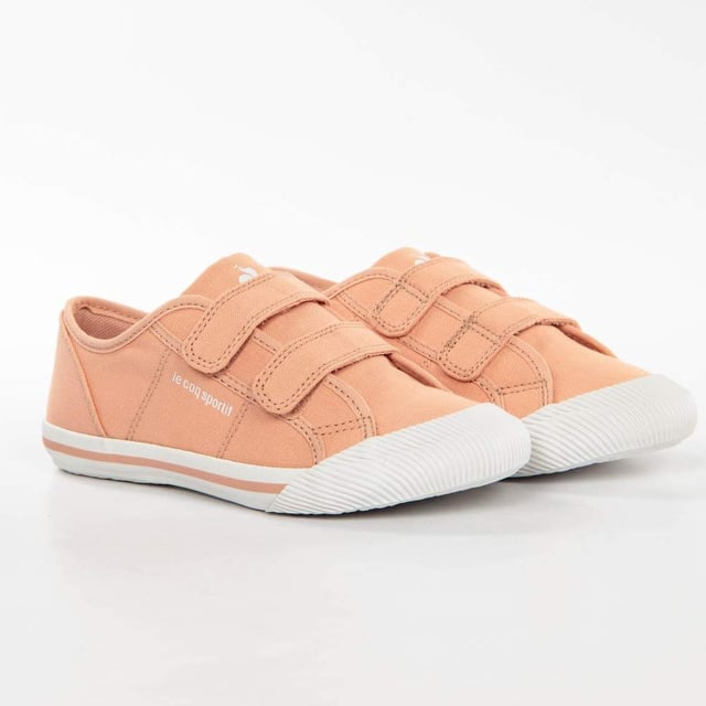 Basket Le Coq Sportif Deauville PS Sport Mädchen Rosa Textil. Authentischer Freizeitschuh der Marke Le Coq Sportif - Straßenmode/Sportswear-Design von Le Coq Sportif - Le Coq Sportif für modebewusste Mädchen, perfekt für den Alltag - Der rosa Le Coq Sportif Basket lässt sich ideal mit dem Rest Ihrer Garderobe kombinieren - Bequemes Textilmaterial - Klassischer Klettverschluss - Deauville PS Sport - Textil.