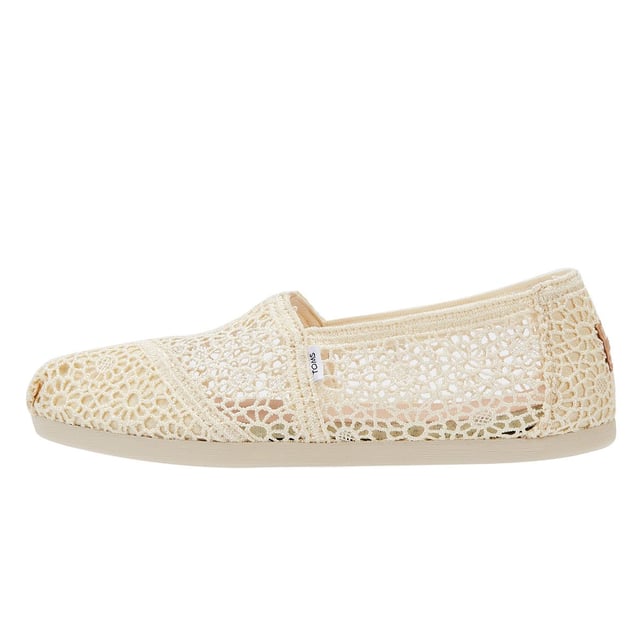 Experience ultimate comfort and style with our exquisite crochet uppers, complemented by the cutting-edge TOMS CloudBound Sole. Crafted to provide exceptional comfort, cushioning, and traction, these shoes are a true delight for your feet. The textile upper is not only trendy but also 100% vegan, making it a perfect choice for conscious consumers. With a removable insole and elastic gore for effortless on-and-off, these shoes are designed to enhance your convenience. Step into a world of comfort and sustainability with our remarkable footwear.