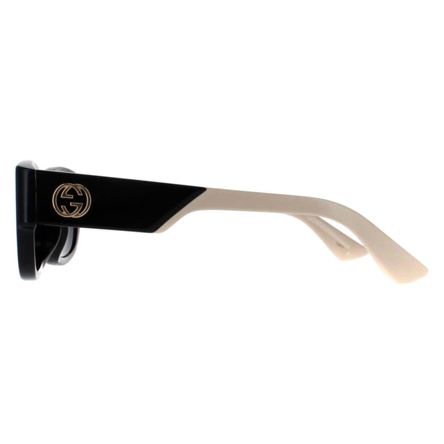 Gucci Square Womens Black with Ivory Grey GG1667SK  Sunglasses feature a refined square shape that adds a touch of vintage allure, these sunglasses embody sophisticated charm while maintaining contemporary appeal. The GG1667SK is adorned with the signature double-G logo on the temples, reinforcing Gucciâ€™s reputation for luxury and attention to detail. The high quality lenses offer excellent UV protection, ensuring comfort and eye safety without compromising style.