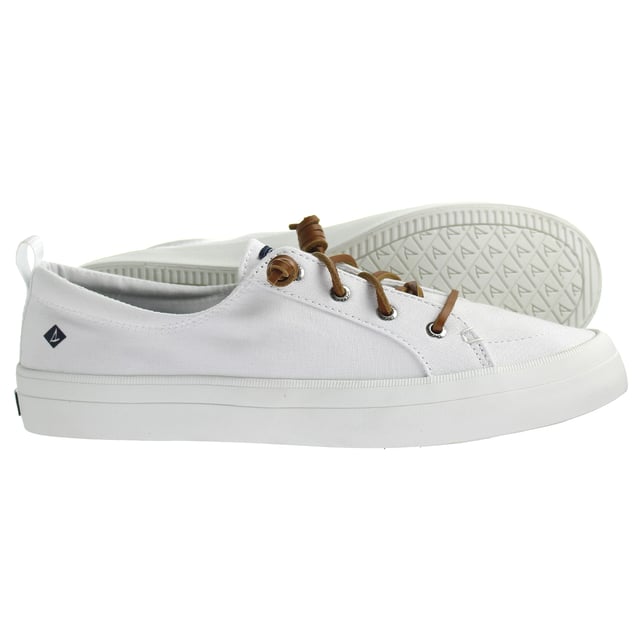 Sperry Crest Vibe Women's White Plimsolls – the perfect fusion of timeless style, coastal inspiration, and everyday comfort. These plimsolls are designed to elevate your casual look while providing exceptional comfort for all-day wear.

Key Features:

 Classic Coastal Charm:  The Crest Vibe Women's White Plimsolls by Sperry capture the essence of coastal living with their classic yet modern design. Whether you're by the shore or exploring the city, these plimsolls exude a relaxed elegance that complements various outfits.

 Quality Craftsmanship:  Crafted by Sperry, a brand renowned for its nautical heritage, these plimsolls boast impeccable craftsmanship. The attention to detail in their design ensures durability and a lasting style that withstands the test of time.

 Day-Long Comfort:  Featuring a cushioned insole and a padded collar, these plimsolls provide exceptional comfort that lasts from morning till night. The cushioning supports your feet throughout your activities, making them ideal for both leisure and light adventures.

 Effortless Slip-On Style:  The convenient slip-on design of the Crest Vibe plimsolls ensures easy on-and-off wear. Whether you're in a rush or seeking a hassle-free footwear option, these plimsolls are your go-to choice.

 Versatile White Hue:  The pristine white color of these plimsolls offers versatility in pairing with a range of outfits. From casual dresses to jeans and shorts, these plimsolls effortlessly elevate your style, making them a wardrobe essential.

 Non-Marking Outsole:  The non-marking rubber outsole not only provides reliable traction but also ensures that you can wear these plimsolls indoors without leaving scuff marks. This feature adds to the versatility and practicality of the shoes.