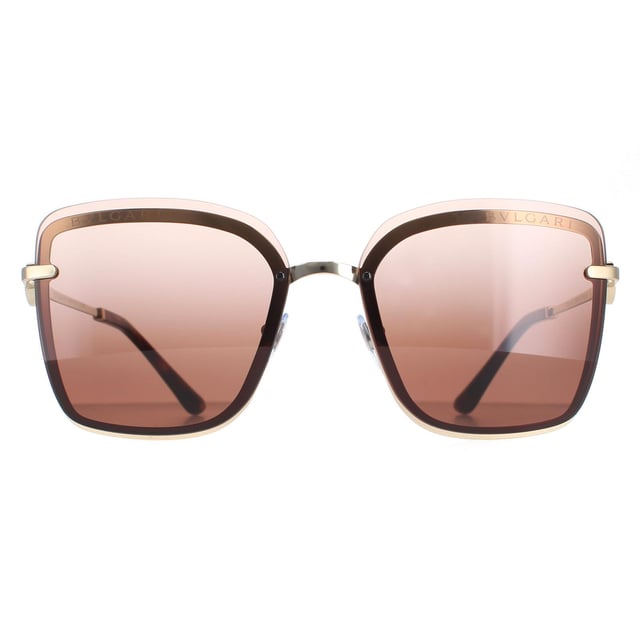 Bvlgari Sunglasses BV6151B 278/13 Pale Gold Brown Gradient are a luxurious square style for women. Adjustable nose pads and plastic temple tips provide all day comfort. The slender temples feature Bvlgari's ring design.