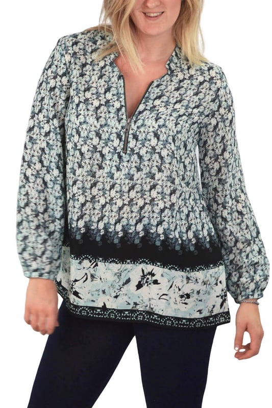 Keep your everyday look stylish with this relaxed fit top. Wear loose with leggings or belted over your favourite jeans. Made from a lightweight woven fabric, with long zip neck and long sleeves with single button cuff.

100% Polyester
Silky Stretch
Sizing: generous 
Long Length
33" Shoulder to Hem
Straight Hem