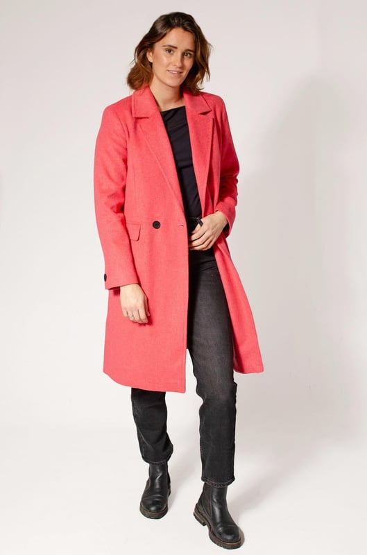 Stay toasty warm in this fabulous winter coat. Made in a thick soft wool blend yarn, in a gorgeous pink. It features a revere collar, double breasted design, and pockets for practicality. The warm wool material and fully lined interior will keep you warm and stylish. Perfect knee length for any occasion.

Soft Thick Wool Fabric
90% Wool 10% Polyamide
Revere Collar
Length: Mid-Length
38" Shoulder to Hem
Sizing: As expected
Fit: Classic