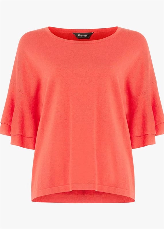 A vibrant red colour pop - made from a super soft fabric that feels delightful against the skin. Add a touch of feminine charm with the double frill sleeves, elevating the classic knit top silhouette with a playful twist. Fit: Classic, Sizing: As expected