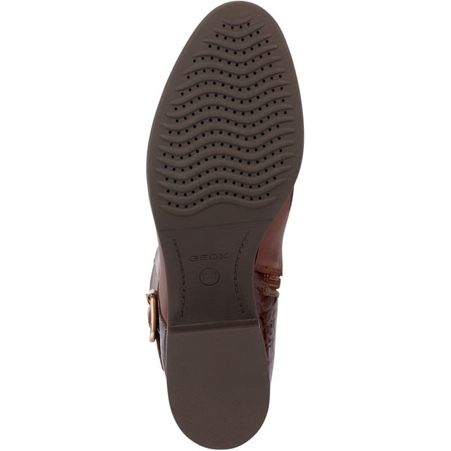 Felicity is a breathable boot for women that  puts a new spin on a classic aesthetic. With a plain-leather upper lifted with attractive detailing and a crocodile-effect printed belt, it will guarantee a mettlesome look that draws all eyes.