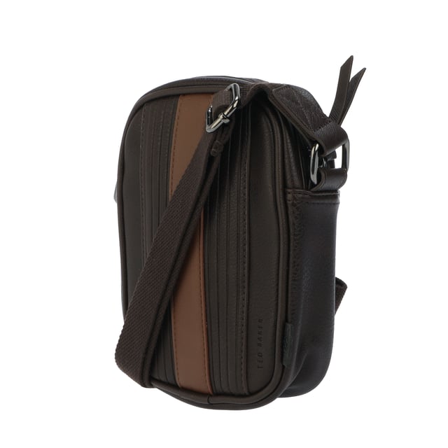 Mens Ted Baker Evver Striped PU Flight Bag in brown.- Adjustable shoulder strap.- Zip fastening.- Stripe detailing.- Ted Baker debossed detail.- Ted Baker-branded.- Shell: 100% Polyurethane. Lining: 100% Polyester.- Ref: 256435BRNCHOC
