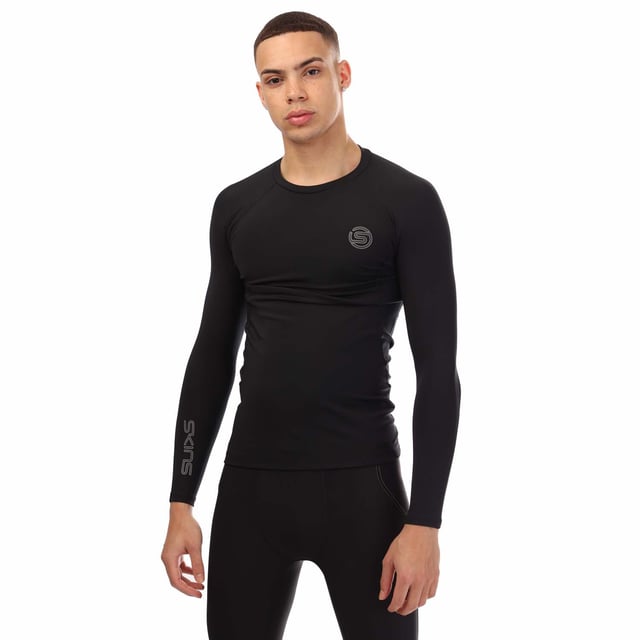 Mens Skins Series-2 Long Sleeve Top in black.- Round neck.- Long sleeves.- Reflective outline logos.- Medium level compression.- Squat proof.- Great absorbency and wicking qualities.- 83% Polyester  17% Elastane.- Ref: SW00200059001