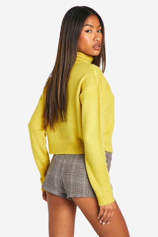 Seeking a pullover jumper that brings super flattering vibes? Look no further than this cute cropped jumper. With the hem cut at or above the waist, this type of short jumper usually comes with long sleeves for maximum style impact and extra warmth. Helping to nip you in at the waist and create an hourglass silhouette, it's a look that will serve attitude over and over again. We wear ours with high waisted denim, slick faux leather trousers and bold animal print skirts for a style that breaks the mould.Style: Lightweight JumperFabric: AcrylicNeckline: Roll NeckSleeve Length: Long Sleeve
