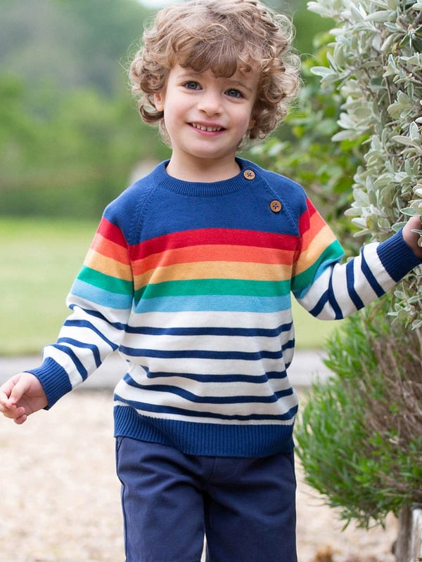 100% organic cotton |  Proud to be certified by Control Union to the Global Organic Textile Standard (GOTS) |  Navy blue and cream stripe with rainbow stripe shoulder |  Lightweight knitwear |  Coconut button raglan sleeve opening (up to and including size 3 years) |  Long sleeved |  Flying Kite embroidery at back |  Made in India |  Machine washable at 40 degrees, or at 30 degrees to be kinder to the planet
