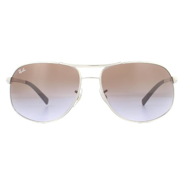 Las gafas de sol Ray-Ban RB3387 003/68 Silver Brown Gradient son una versión más grande de las clásicas gafas de piloto Ray-Ban. Estas tienen un brazo mucho más ancho con la clásica forma de aviador.