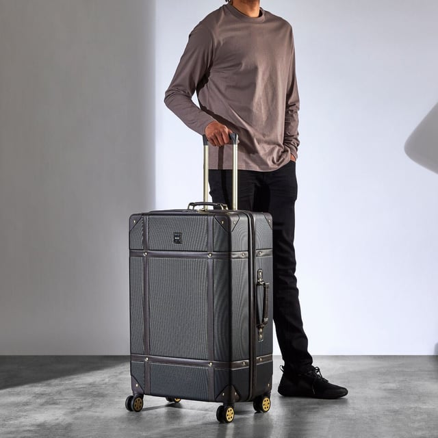 Introducing the Vintage Hard Shell Suitcase - a fusion of timeless aesthetics and modern functionality, exclusively designed for Modern Explorers. This trunk-inspired masterpiece marries classic charm with lightweight construction and robust durability.

Product Design Features:

Classic Meets Contemporary: The Vintage Hard Shell Suitcase seamlessly blends classic and contemporary design elements, embodying timeless elegance and modern convenience.
Effortless Mobility: With eight smooth-rolling wheels and a telescopic handle, this suitcase offers effortless gliding, ensuring you navigate through your adventures with ease.
Ultimate Protection: Crafted from impact-resistant hard shell ABS material, this suitcase provides ultimate protection for your belongings, while reinforced corners safeguard against the rigors of baggage handling.
Security Without Compromise: An integrated Travel Sentry-approved TSA combination lock ensures security without compromise, offering peace of mind throughout your journey.
Thoughtful Interior: Experience luxury within, featuring soft-touch lining, a mesh divider section, and a zipped pocket for organized packing. Additionally, a convenient zipped inside pocket and elasticated packing straps keep your belongings securely in place during your explorations.
Elevate your travel experience with the Vintage Hard Shell Suitcase - a symbol of style, durability, and convenience for the Modern Explorer.

Sizes:

Cabin: 55 x 35 x 22cm, 3kg
Medium: 68 x 45 x 26cm, 4kg
Large: 78 x 50 x 29cm, 5kg
Set of 3 Sizes: Cabin+ Medium+ Large. Note: This product comes in set of multiple sizes, and you will get all the sizes seen in the images