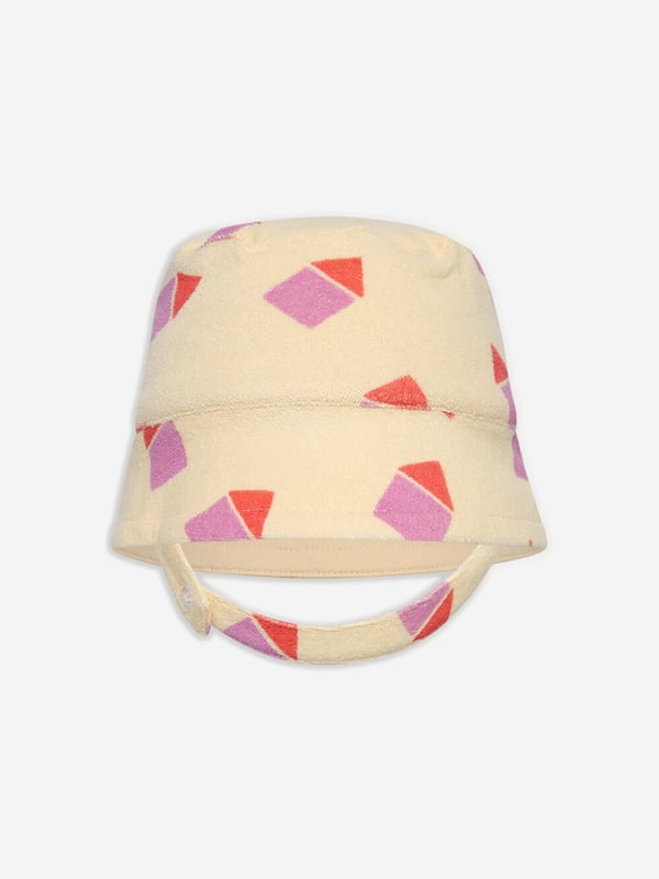 Introduce the Girls Beach Hut Sun Hat in Ivory, an elegant addition to your Baby_Girls' wardrobe! This enchanting hat is perfect for a stylish Holiday retreat. Here are its distinctive features:‚ Chic Design: This ivory sun hat flaunts a delightful beach-hut inspired print, rendering it a fashionable accessory. ‚Luxurious Comfort: Using premium materials, this hat promises exceptional comfort for your little one's vacation escapades.‚Uplift your Baby_Girls look! with the Girls Beach Hut Sun Hat in Ivory, a chic offering by The Bonnie Mob. Add this to your cart now for a stylish upgrade!
