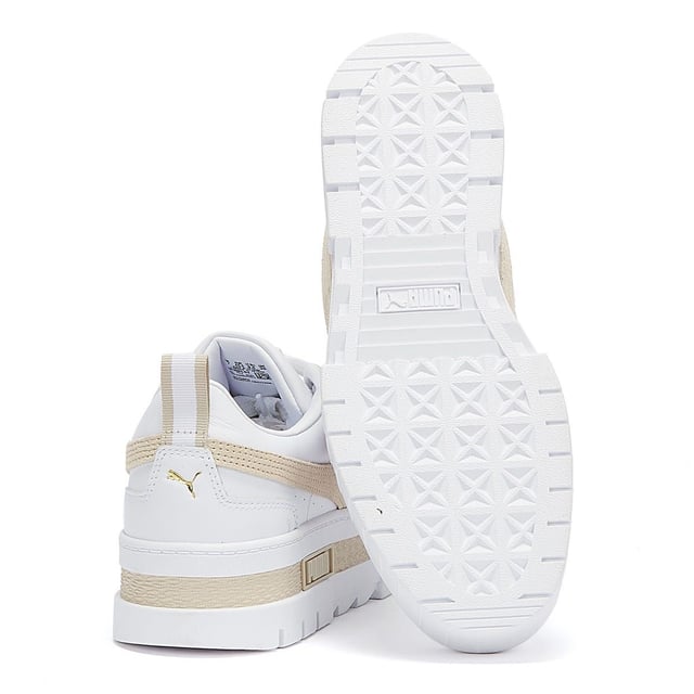 PRODUCT STORY : We made this one for the hype girls, street enthusiasts and trend mavens - basically for those who want to stand out with sophisticated swagger. Taking design elements from the urban environment and injecting them with extra edge, the Mayze encompasses attitude. Crisp and clean, with a luxurious leather upper, sleek suede overlays, eye-catching colour contrasting and a seriously stacked sole, these trend-setting trainers will be the envy of every onlooker. DETAILS : Leather upper with suede and synthetic overlays Glossy eyelets Elevated rubber midsole with textured tooling Rubber outsole Lace closure for a snug fit PUMA branding at tongue Foil-printed PUMA No.2 Logo at quarter PUMA Formstrip at medial and lateral sides PUMA Wordmark at tooling Foil-printed PUMA Cat Logo at heel