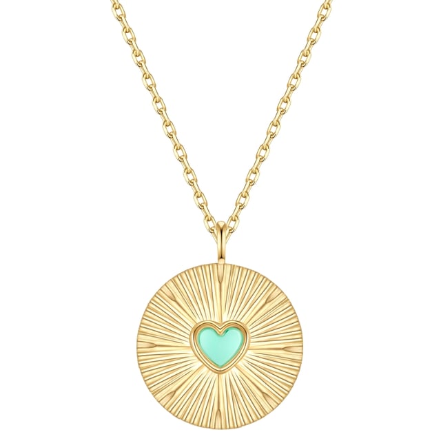Eye-catching necklaces are in trend - like this model from the Glanzstücken München label in boho style. The eye-catcher is the antique structured surface of the amulet-shaped pendant with a sun motif, decorated with a heart-shaped turquoise inlay (rec.) Did you know that the healing stone was revered as a good luck charm in many cultures in ancient times? Even today, turquoise is still popular as a protective stone and talisman in jewelry form. The pendant dangles from a delicate anchor chain, both made from 925 sterling silver and finished with warm, shiny yellow gold. Thanks to the extension piece with spring ring clasp, the length of the chain can be easily adjusted. An accessory that not only casually enhances festival outfits!