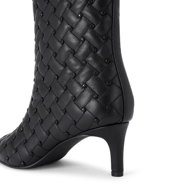 This Kurt Geiger Regent Ankle Boot features a black leather upper with antiqued brass toe cap. There is an antiqued brass eagle head sat on top of the toe all sat on a fashionable kitten heel. Heel height: 6.5cm.