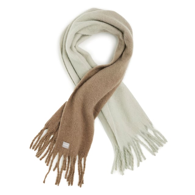 100% Polyester. Stof: Boucle, Garen. Ontwerp: Ombre, Kwastje.
