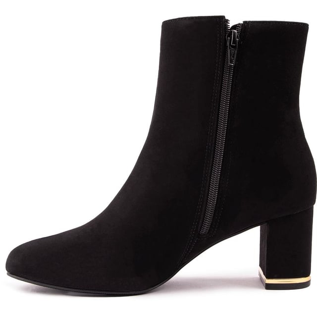 Ted Baker Noranas Boots Step Up Your Shoe Game And Step Out Of Line, With The Noranas Ankle Boots From Ted Baker. Crafted From Luxurious Suede Leather, They Offer Both Style And Comfort. The Sleek Design Is Complemented By A Chic Block Heel And Gold-tone Heel Trim, That'll Take You From Day To Night With Ease.