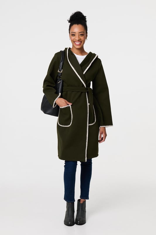 Throw on an extra layer in style with this tie up coat. It's finished with a decorative blanket stitch and front pockets, as well as an adjustable waist tie. The longline thigh length hem will look great layered over trousers, jeans or a skirt, so you can wear it with practically any outfit.