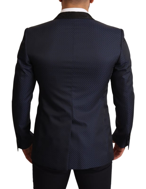 Stunning Dolce & Gabbana MARTINI Slim Fit Blazer Jacket
  Single breasted one-button style
  Slim fit for a great fitting and comfort
  Beautiful blue color
  Three outside pockets and two inside pockets
  One open vent in the back for breathability
  Logo details for a signature touch
  Made in Italy with premium materials
  Material: 6% AC 50% PL 11% Silk 33% Wool
  Lining: 100% Silk
Material: 6% AC 50% PL 11% Silk 33% Wool