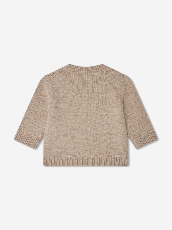 Introducing the luxurious Baby Boys Almire Jumper in Beige by Bonpoint, your must-have for AW2024. This finely crafted piece encapsulates elegance and comfort in an ivory hue, perfect for any stylish baby boy. Key features include: Exquisite Knit: Carefully woven to ensure both warmth and breathability.   Timeless colour: Ivory for versatile style across seasons.   Premium Comfort: Ultra-soft fabric gentle on delicate skin.   Designer Touch: Signature Bonpoint quality and design.Elevate his wardrobe with this essential Almire Jumper. Order today!
