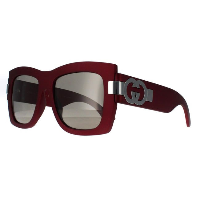 Gucci Square Womens Red with Silver Grey with Light Silver Mirror GG1688S  Sunglasses offer a perfect combination of modern sophistication and understated luxury. With their bold, square frame, these sunglasses make a striking fashion statement while maintaining a timeless appeal suitable for various occasions. The design is complemented by Gucciâ€™s signature double-G logo on the temples, adding a touch of iconic branding that speaks to the wearerâ€™s impeccable taste. High-quality lenses provide essential UV protection, ensuring comfort and safety without compromising on elegance.