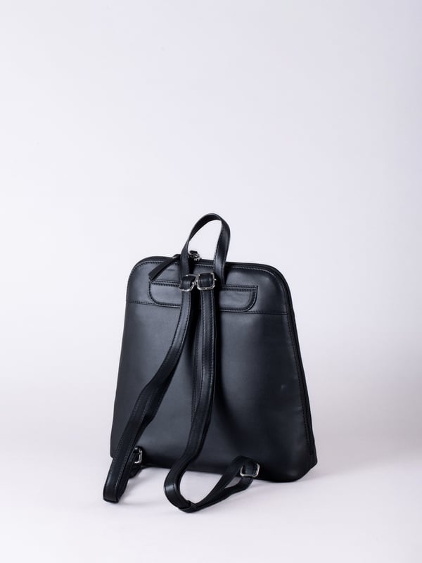 The Talkin handbag collection is a study in sleek sophistication, and this practical backpack is no exception. Crafted from soft premium leather, this classic design has plenty of space to ensure you can carry all your essentials with ease. The adjustable leather straps offer unparalleled comfort, and we've included a grab handle for convenient carrying.