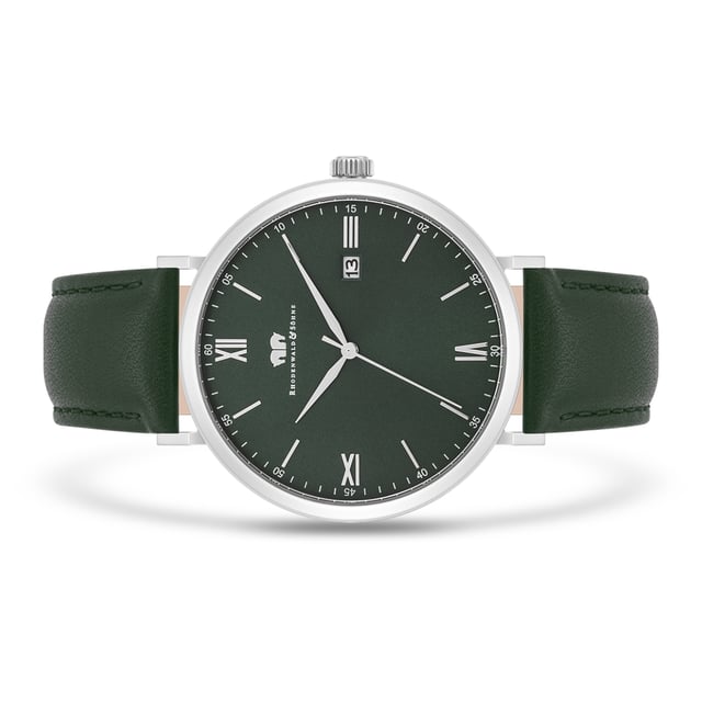 Stylish minimalism inspires from the principles of traditional Horlogerie: This timepiece of the Rhodenwald & Söhne manufacture is an accessory that also scores in demanding men and is often worn in the office and in leisure time. The puristic dial is limited to filigree Roman digits and line indices, a subtle minute and date display. The noble shimmering stainless steel case forms a narrow frame for the dial and nestles elegantly on every wrist. The real leather strap with color -coordinated seam ensures high comfort.