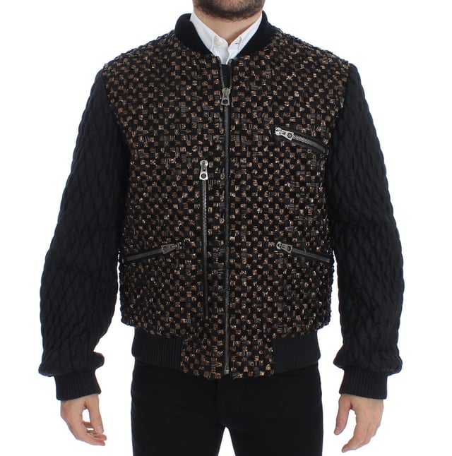 100% authentic Dolce & Gabbana black sequined jacket with gold detailing
  Straight from the Runway/catwalk
  Full zipper closure
  Four front pockets with zipper closure
  Two inside pockets
  Gold and black colored sequined detailing
  Quilted stitched arms
  Warm inner lining
  Logo details and logo engraved metal detailing
  Made in Italy
  Material: 35% Goatskin Leather 30% Lana wool 20% Glass 10% Plastic 5% Wool
  Lining: 42% Rayon 42% Acetate 16% Goatskin
Material: 35% Goatskin Leather 30% Lana wool 20% Glass 10% Plastic 5% Wool