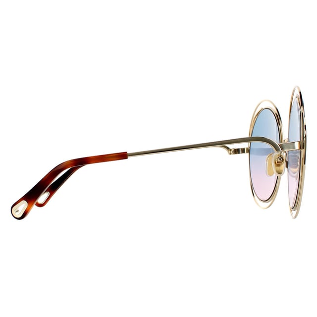 Chloe Round Womens Goudblauw roze gradiënt Ch0045S Zonnebril zijn een oversized ronde stijl met een sculpturaal bekabeld frame, siliconenneuspoten en tempels geëtst met het Chloe -logo.