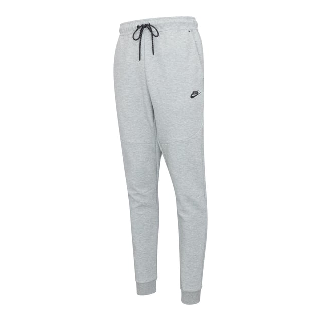 Nike Sportswear Tech Fleece Full Zip Tracksuit Grey Upgrade your wardrobe with the Nike Sportswear Tech Fleece Tracksuit Set, designed for modern comfort and style. Featuring the iconic Tech Fleece Full-Zip Hoodie and Tapered Joggers, this set offers premium warmth without the bulk, making it an essential choice for everyday wear and casual outings.
Key Features:
Tech Fleece Fabric: Engineered with lightweight, double-sided fabric for superior insulation and a sleek, streamlined appearance.
Full-Zip Hoodie:
Panelled hood for enhanced coverage and warmth.
Split kangaroo pockets for convenient storage.
Durable, bonded zipper with a smooth glide and signature tape detailing.
Tapered Joggers:
Tapered fit with ribbed cuffs for a clean, modern silhouette.
Zippered side pocket with bonded trim for secure storage of small essentials.
Elastic waistband with an adjustable drawcord for a personalised fit.
Composition:
Body: 66% Cotton / 34% Polyester
Pocket Bag Palm Side: 69% Cotton / 31% Polyester
Pocket Bag Knuckle Side: 100% Cotton
Why You’ll Love It:
The Nike Sportswear Tech Fleece Tracksuit Set is designed to keep you warm while maintaining a lightweight feel. The hoodie’s structured hood and sleek zipper details complement the joggers' tapered leg for a streamlined, stylish finish. Whether you're on the go or relaxing, this tracksuit offers the perfect combination of functionality and fashion.
Pair it with your favourite Nike sneakers for an effortlessly cool look.