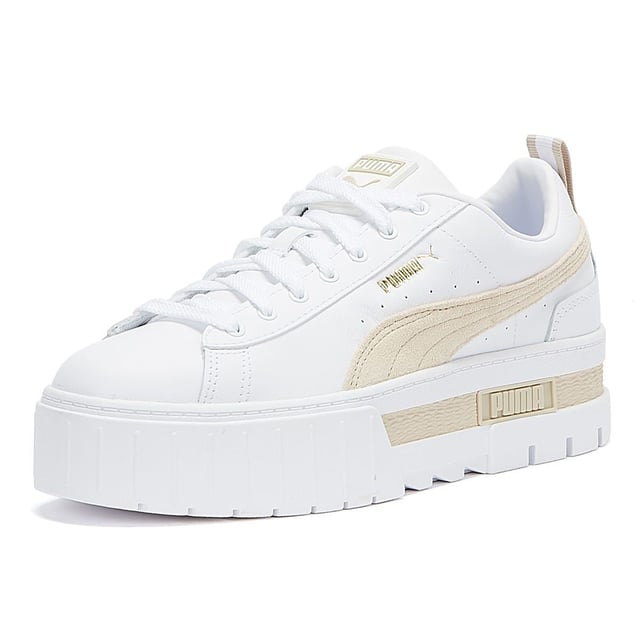 PRODUCT STORY : We made this one for the hype girls, street enthusiasts and trend mavens - basically for those who want to stand out with sophisticated swagger. Taking design elements from the urban environment and injecting them with extra edge, the Mayze encompasses attitude. Crisp and clean, with a luxurious leather upper, sleek suede overlays, eye-catching colour contrasting and a seriously stacked sole, these trend-setting trainers will be the envy of every onlooker. DETAILS : Leather upper with suede and synthetic overlays Glossy eyelets Elevated rubber midsole with textured tooling Rubber outsole Lace closure for a snug fit PUMA branding at tongue Foil-printed PUMA No.2 Logo at quarter PUMA Formstrip at medial and lateral sides PUMA Wordmark at tooling Foil-printed PUMA Cat Logo at heel