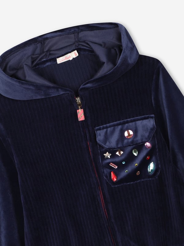 Introducing the Girls Velour Zip Up Top in Navy from billieblush, a true reflection of sophistication and comfort for the AW2024 season. Each piece meticulously crafted to offer an unparalleled experience for your little girl. Here are the standout features: **Chic Navy Hue:** Timeless navy colour that oozes elegance versatility.   **Luxurious Comfort:** High-quality fabric ensures all-day comfort, perfect for your girl's dynamic life.   **Designer Accents:** Unique billieblush detailing sets this tracksuit apart, making it not just apparel but a style statement.   **Functional Pockets:** Stylish yet functional pockets for keeping little treasures safe.Elevate her wardrobe with this exquisite designer ensemble. Ideal for both casual and special occasions!