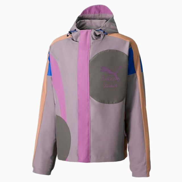 The Puma x KidSuper Studios Zip Up Multicoloured Men's Lightweight Jacket is a vibrant and eye-catching outerwear piece that combines fashion with functionality. This jacket features a striking color block design, showcasing a mix of bold hues, including purple, blue, and earthy tones, making it a standout addition to any wardrobe.
Constructed from lightweight materials, this jacket is ideal for layering and provides comfort without adding bulk. The full zip closure allows for easy wear and adjustable ventilation, while the hood offers added protection against the elements.
The Puma logo is prominently displayed, showcasing a blend of sporty and artistic elements that reflect the collaboration's creative vision. The playful yet stylish design makes it perfect for casual outings, sports activities, or simply adding a unique touch to everyday outfits.
With its trendy aesthetic and comfortable fit, this Puma x KidSuper Studios jacket is not just a piece of clothing—it's a statement of style and individuality. Perfect for fashion-forward individuals looking to express their personality while staying cozy and protected.