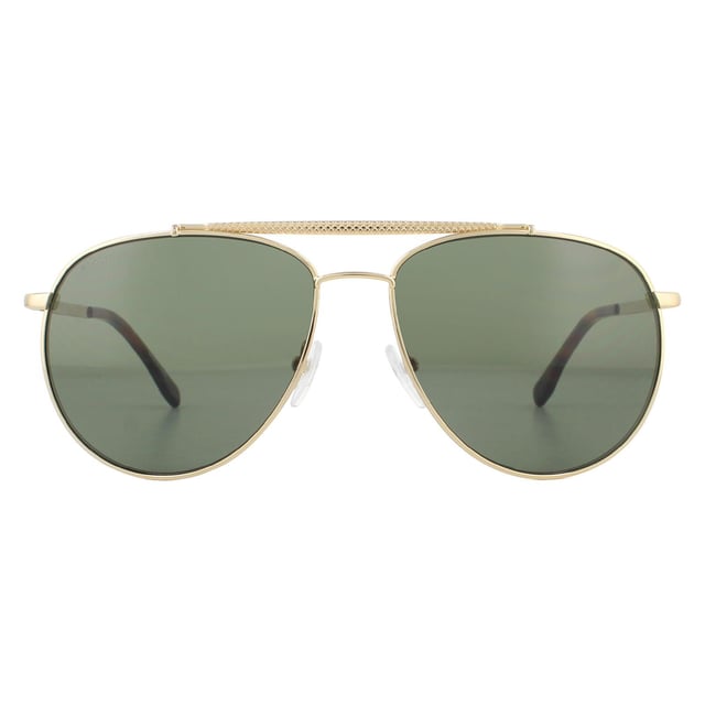 Lacoste Sunglasses L177S 714 Gold Grey are a classy pilot style with textured temples and matching brow bar for a luxurious chic finish. The Lacoste lettered logo at the temples completes these cool aviator Lacoste shades.