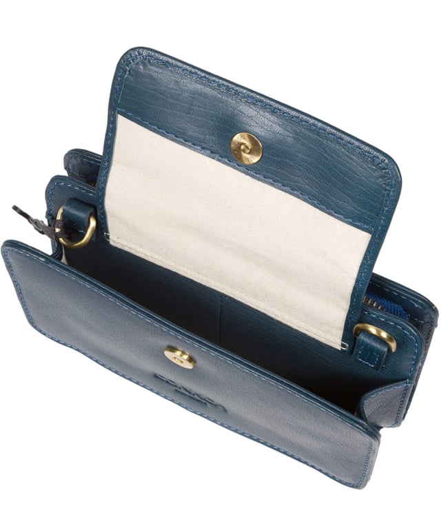 The 'Little Wonder' cross body clutch bag from Conkca London is handcrafted from multi-toned leather for a beautiful finish. A magnetic press-stud secured cover opens to reveal a compartment ideal for a smartphone. A zip-over top opens to reveal a second compartment that is perfect for your essential items and has three handy card slots. Lined with natural and untreated 100% cotton. It comes with an adjustable leather strap with a maximum drop length of 68cm, which is removable, converting the bag into a clutch bag. Adorned with the inimitable Conkca squirrel charm and Conkca logos.