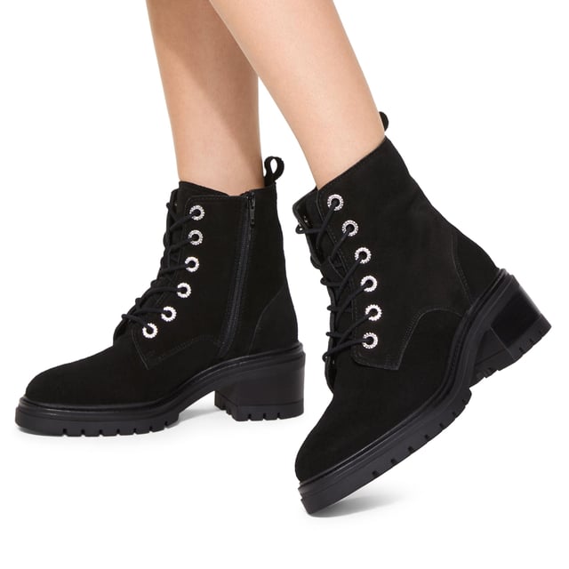 This KG Kurt Geiger Crystal Lace Up Boot features a black suede upper with crystal eyelets at the front. There is a small gunmetal KGL stud at the back of the ankle.
