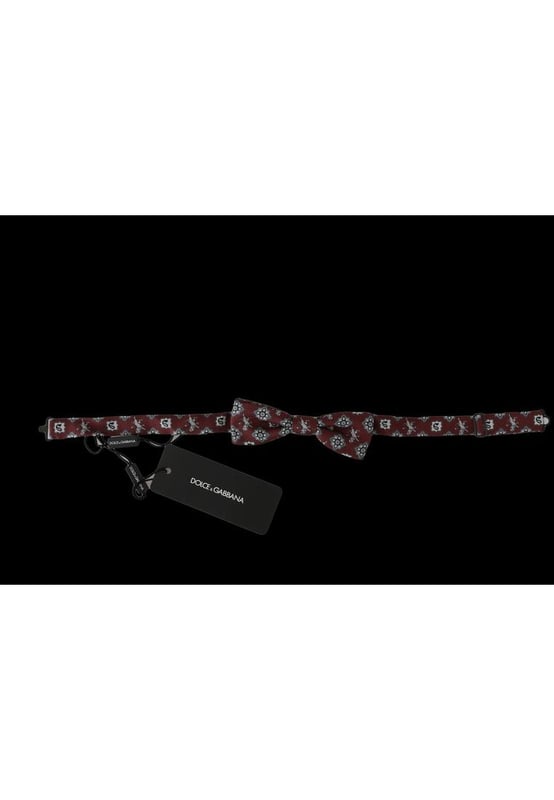 DOLCE & GABBANA Exclusive Bow Tie
  100% Silk
  Bordeaux color with maroon lion print
  Adjustable length neck strap
  One size fits all
  Made in Italy
  Original tags and store bag included
Material: 100% Silk