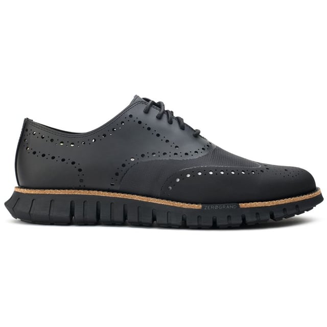 Mens black Cole Haan zerogrand remastered shoes, manufactured with leather and a rubber sole. Featuring: flowerfoam sole, brogue detail, cole haan branding and dandelion rubber.
