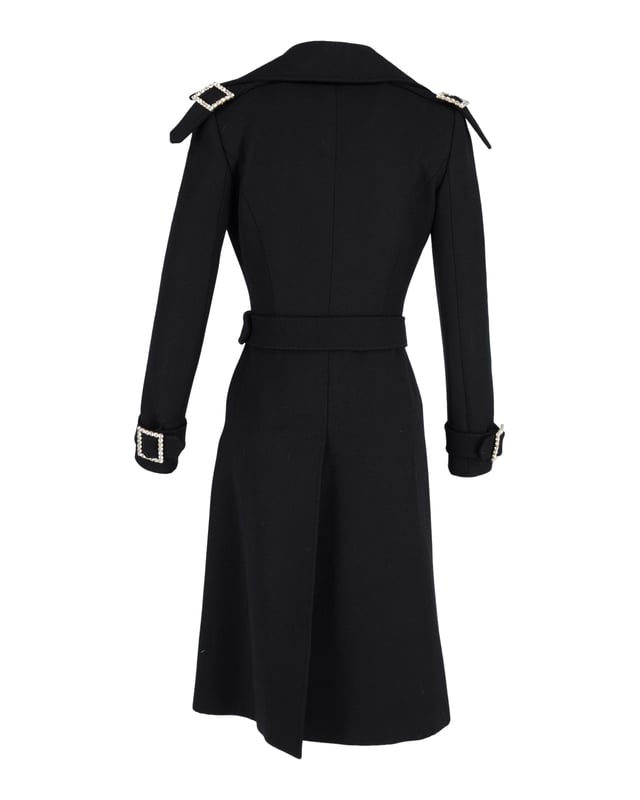 VINTAGE, RRP AS NEW
Experience the epitome of luxury with the Dolce & Gabbana Double-Breasted Coat with Belt in Black Wool, a statement-making piece that exudes elegance and refinement. Crafted from the finest black wool, this coat features a classic collar, crystal buttons, long sleeves, and pockets for practicality, while the belt cuffs with crystal buckles add a touch of glamour and sophistication. The exquisite animal print lining adds a luxurious and unique touch, making this coat a must-have for those who appreciate the finer things in life.



Dolce & Gabbana Double-Breasted Coat with Belt in Black Wool
Condition: very good
Material:   Wool/Hair | Lana vergine
Size: EU40
Sign of wear: slight stains
SKU: 358075