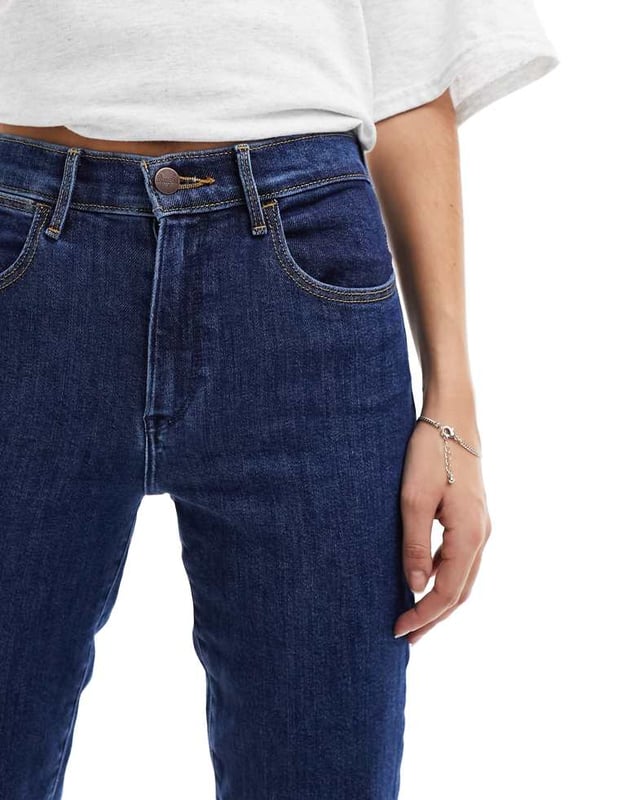 Jeans by Wrangler Join the jean scene Straight fit High rise Belt loops Functional pocketsSold By: Asos